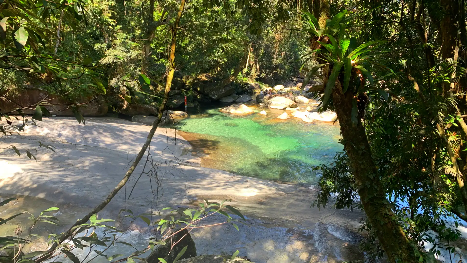 A blue pool at Josephine Falls, a waterfall near Cairns.